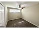Cozy bedroom with carpeted floor, ceiling fan, and a window at 3317 Renault Se Rd, Atlanta, GA 30354