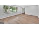 Bright living room with hardwood floors and large windows at 3440 Concord Se Cor, Conyers, GA 30013