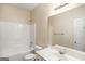 Clean bathroom featuring a shower-tub combo and a single-sink vanity at 3634 Cape Ln, Conyers, GA 30013
