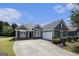 Charming one-story home featuring a two-car garage, well-maintained landscaping, and inviting curb appeal at 3634 Cape Ln, Conyers, GA 30013