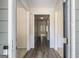 Inviting foyer with hardwood floors and neutral paint creates a warm and welcoming entrance to the home at 3634 Cape Ln, Conyers, GA 30013