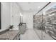 Modern bathroom features granite countertops, a tiled shower, and ample cabinet space at 3911 Peeksville Rd, Locust Grove, GA 30248
