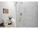 Elegant bathroom featuring a glass-enclosed shower, modern fixtures, and a standalone bathtub at 3911 Peeksville Rd, Locust Grove, GA 30248
