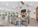 Spacious living room with vaulted ceilings, fireplace, and open floor plan at 3911 Peeksville Rd, Locust Grove, GA 30248