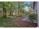 Spacious backyard featuring mature trees and a tranquil setting at 5362 Kelleys Mill Cir, Stone Mountain, GA 30088