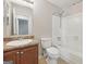 A full bathroom features a vanity with sink and tub with shower at 5362 Kelleys Mill Cir, Stone Mountain, GA 30088