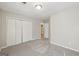 Spacious bedroom features a carpeted floor, closet, and neutral paint at 5362 Kelleys Mill Cir, Stone Mountain, GA 30088