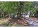 Charming two-story home with a stone accent, attached garage and professionally landscaped front yard at 5362 Kelleys Mill Cir, Stone Mountain, GA 30088