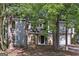 Charming two-story home with a stone accent, attached garage and professionally landscaped front yard at 5362 Kelleys Mill Cir, Stone Mountain, GA 30088