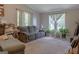 Relaxing living room with comfortable seating, natural light, and neutral decor at 714 Yates Rd, Bowdon, GA 30108