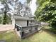View of the backyard and wooden deck at 4049 Brookcrest Cir, Decatur, GA 30032