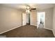 Spacious bedroom with fan, carpet, and attached bathroom at 4049 Brookcrest Cir, Decatur, GA 30032