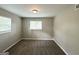 Cozy bedroom with carpet, neutral paint, and good natural light at 4049 Brookcrest Cir, Decatur, GA 30032