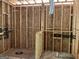 Framing of new home construction with plumbing and ductwork present at 95 Cambridge, Covington, GA 30014