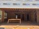 Framing of new home construction with table and ladder present at 95 Cambridge, Covington, GA 30014