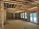 Framing of new home construction with windows and exterior door at 95 Cambridge, Covington, GA 30014