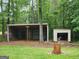 Backyard view of outbuildings at 350 Lakeview Dr, Brooks, GA 30205