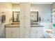 Dual sink bathroom with modern cabinetry, granite counters, and tub at 4333 Deer Ridge Ct, Lilburn, GA 30047