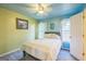 Cozy bedroom with neutral carpet, dual-toned walls, and ample natural light, perfect for relaxation at 4333 Deer Ridge Ct, Lilburn, GA 30047