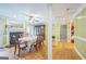 Spacious dining room featuring hardwood floors, a fireplace, and seamless flow into other living spaces at 4333 Deer Ridge Ct, Lilburn, GA 30047