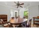 Dining room featuring tray ceiling and vintage lighting at 3313 Henson Ln, Stockbridge, GA 30281