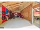 Spacious garage interior featuring an American flag design and ample storage for a home gym at 3313 Henson Ln, Stockbridge, GA 30281