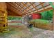 Open carport area with ample space for equipment storage and covered parking, enhancing functionality at 3313 Henson Ln, Stockbridge, GA 30281