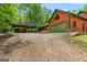Spacious garage and covered parking area providing ample space for vehicles and equipment at 3313 Henson Ln, Stockbridge, GA 30281