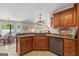 Modern kitchen with granite countertops, stainless steel appliances, and open layout at 3313 Henson Ln, Stockbridge, GA 30281