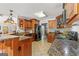 Well-appointed kitchen featuring custom wood cabinetry and granite countertops at 3313 Henson Ln, Stockbridge, GA 30281