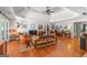 Spacious living room features wood floors, tray ceiling, comfortable seating, and eclectic decor at 3313 Henson Ln, Stockbridge, GA 30281