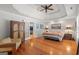 Large main bedroom with wood floors and French doors leading to a walk-in closet at 3313 Henson Ln, Stockbridge, GA 30281