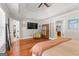 Main bedroom with closet, TV and ceiling fan at 3313 Henson Ln, Stockbridge, GA 30281