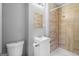 Tiled bathroom featuring a vanity, toilet, and walk in shower at 765 Shellnut Dr, Forest Park, GA 30297
