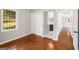 Bedroom with hardwood floors, closet, and views to the bathroom at 765 Shellnut Dr, Forest Park, GA 30297