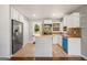 Bright kitchen with stainless steel appliances, wooden countertops and eat in kitchen island at 765 Shellnut Dr, Forest Park, GA 30297