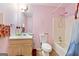 Practical bathroom with shower-tub, vanity, and essential fixtures at 2804 Davis Mill N Rd, Dallas, GA 30157