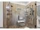 Modern bathroom featuring a glass-enclosed shower with dual shower heads and convenient seating at 411 Johnson Rd, Locust Grove, GA 30248