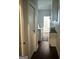 Bright laundry room with white cabinets, washer and dryer, and a clean, functional design at 411 Johnson Rd, Locust Grove, GA 30248