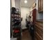 A well-organized walk-in closet with shelving and hanging rods offers ample storage space at 411 Johnson Rd, Locust Grove, GA 30248