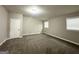 Spacious bedroom featuring new carpet, neutral colored walls and abundant natural light at 4487 Greenleaf Sw Cir, Atlanta, GA 30331