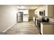Modern kitchen featuring stainless steel appliances, granite countertops, and new wood floors at 4487 Greenleaf Sw Cir, Atlanta, GA 30331