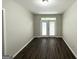 This room has beautiful wood floors and a set of French doors leading to the outside at 4487 Greenleaf Sw Cir, Atlanta, GA 30331