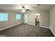 This large bedroom features new carpet, neutral walls, two windows and an attached bathroom at 4487 Greenleaf Sw Cir, Atlanta, GA 30331