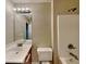 Well-lit bathroom features a modern vanity with ample counter space and a large mirror at 330 Bentleigh Station Dr, Acworth, GA 30101
