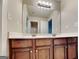 Spacious bathroom with double vanity and a view into a second bathroom at 330 Bentleigh Station Dr, Acworth, GA 30101