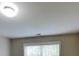 Bedroom featuring carpet and large window for natural light at 330 Bentleigh Station Dr, Acworth, GA 30101