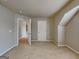 This is a spacious bedroom featuring neutral carpet and paint, and access to other rooms at 330 Bentleigh Station Dr, Acworth, GA 30101