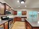 Well-equipped kitchen featuring stainless steel appliances, granite countertops, and ample cabinet space at 330 Bentleigh Station Dr, Acworth, GA 30101