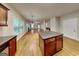 Open-concept living room offers hardwood floors, natural light, and seamless flow, perfect for entertaining at 330 Bentleigh Station Dr, Acworth, GA 30101
